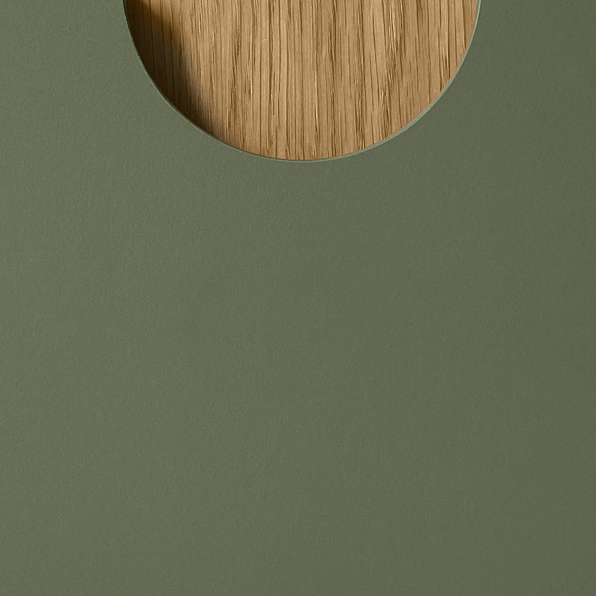 Sample of Half Moon Linoleum facade in olive color. Wood handle in natural oak color 