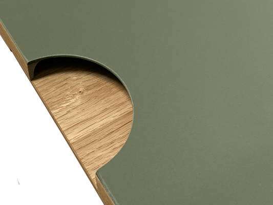 Sample of Half Moon Linoleum facade in olive color. Wood handle in natural oak color 