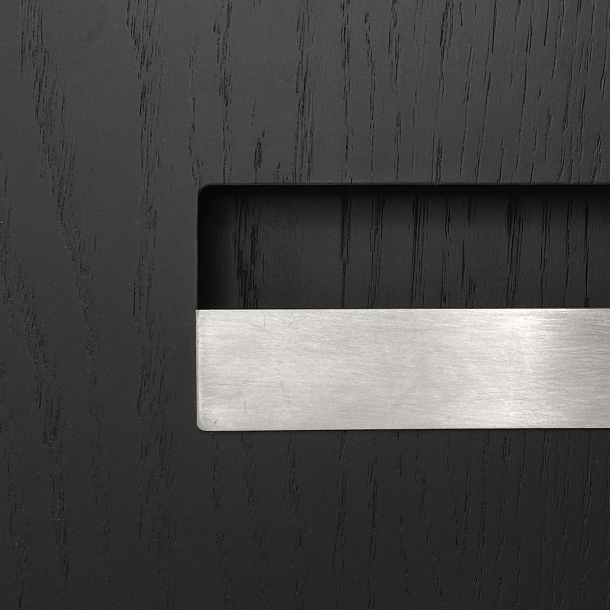 Sample of the facade Dotyk Wood black oak. Stainless steel handle 