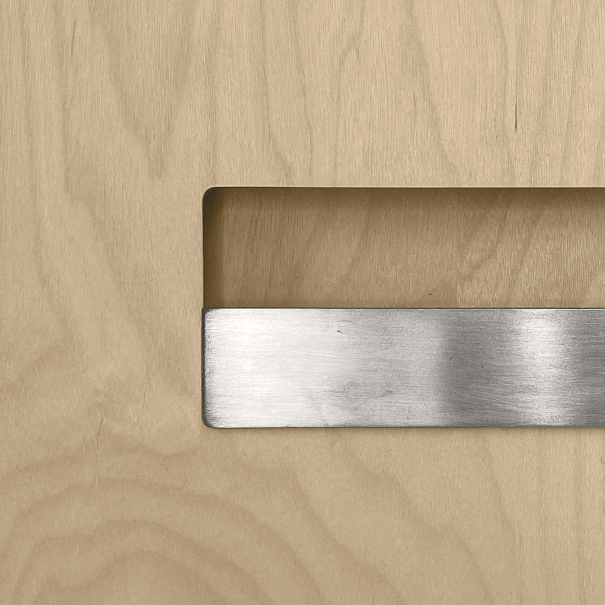 Sample of the facade Dotyk Wood sand birch. Stainless steel handle 
